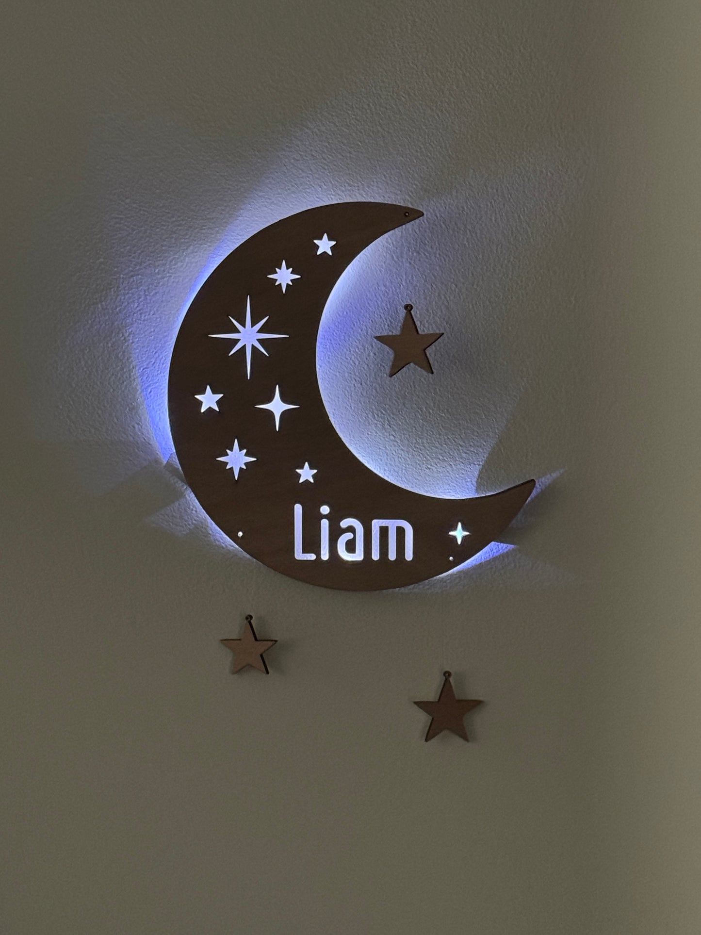 Personalized half moon LED wall light with name and hanging stars – perfect for nursery or kids’ room night light.