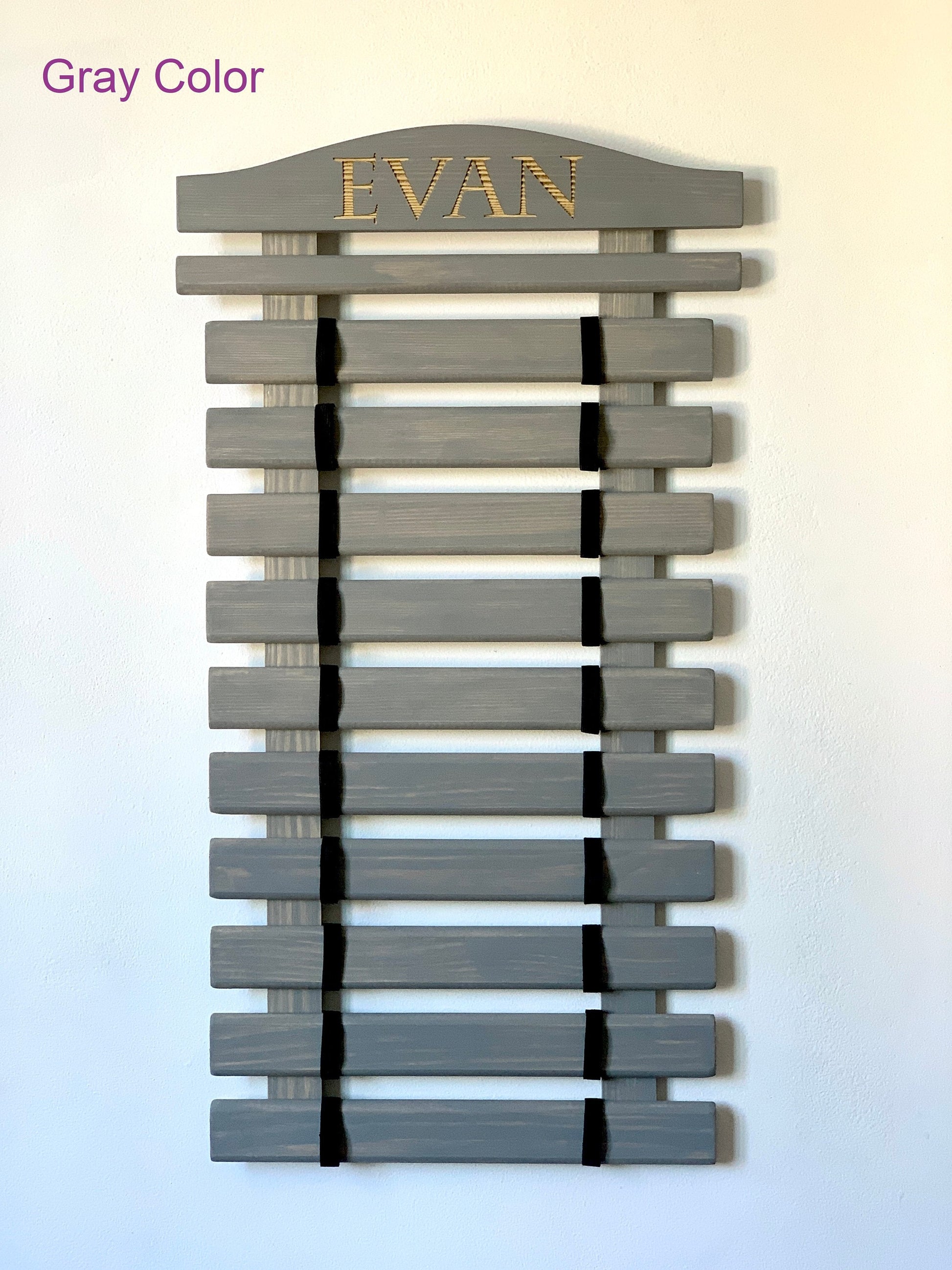 Personalized wooden martial arts belt display rack with engraved name, available in multiple colors and sizes (5-18 belts), perfect for Karate, Taekwondo, and Jiu-Jitsu practitioners.