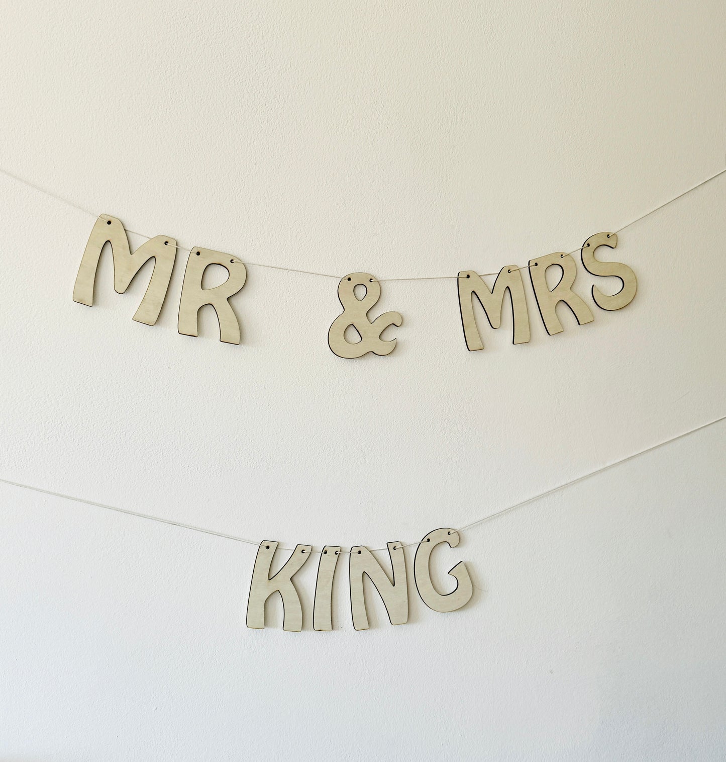 Engraved wooden wedding decoration bunting for rustic or boho weddings