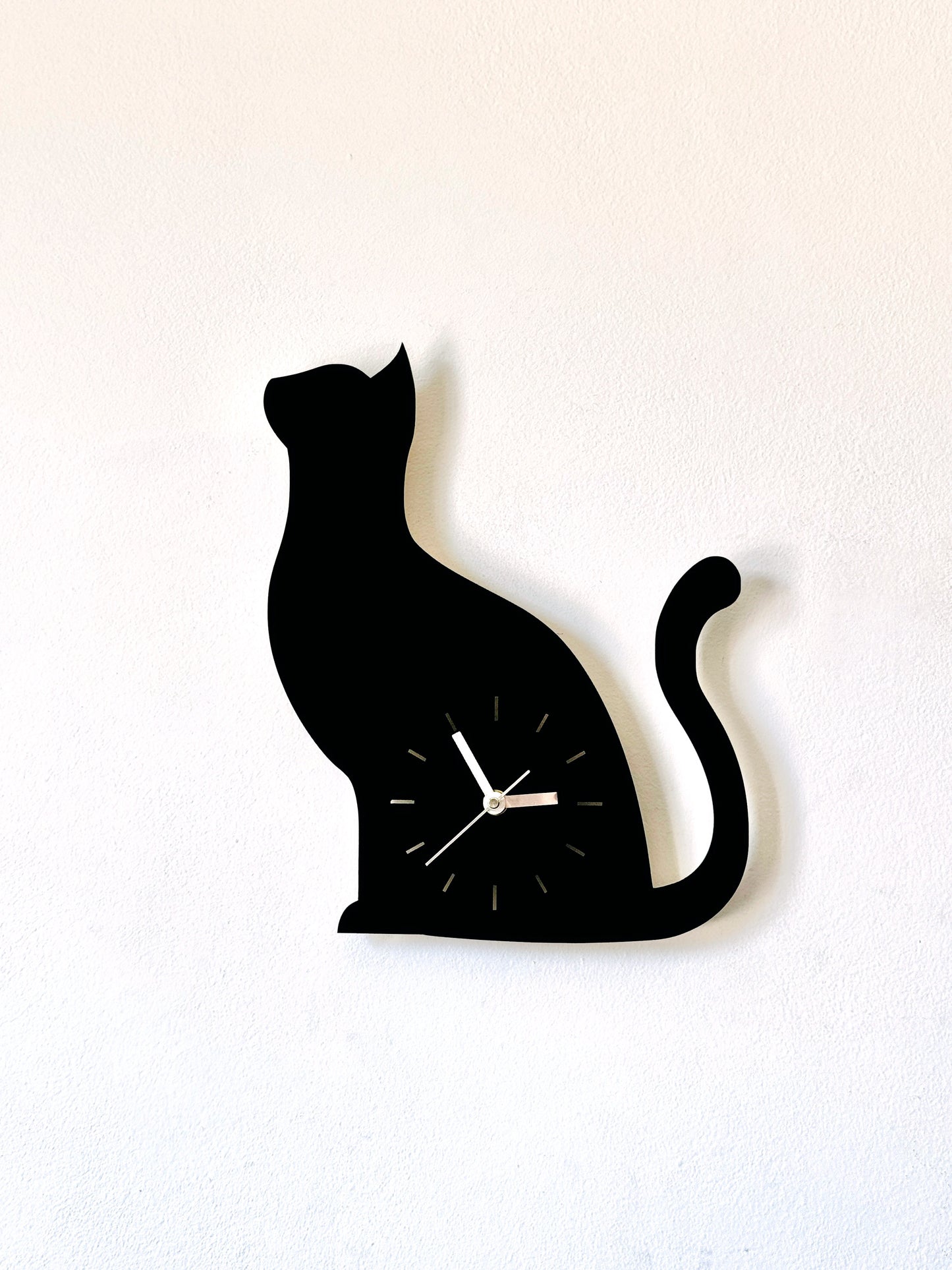 Black & white wooden cat wall clock with an angry cat silhouette design, perfect for cat lovers and unique home decor.