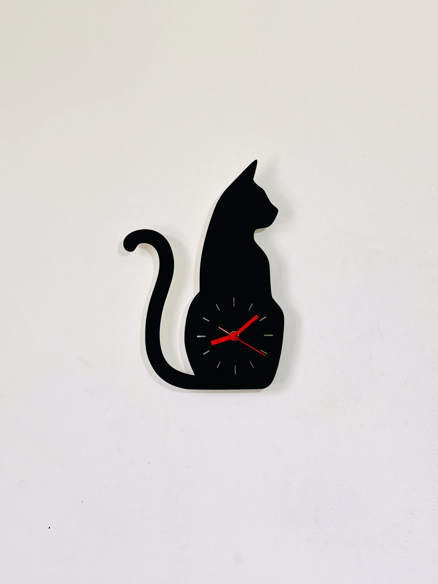 Black & red wooden cat wall clock with an angry cat silhouette design, perfect for cat lovers and unique home decor.