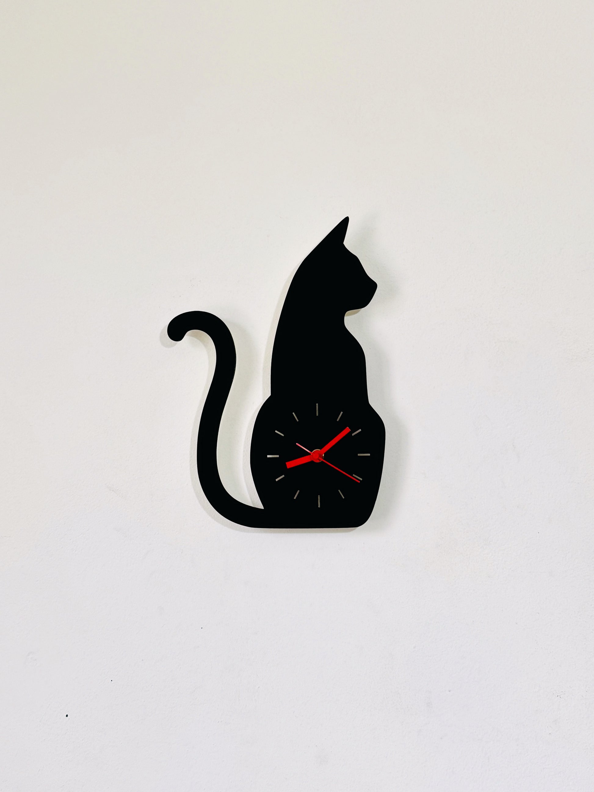 Black & red wooden cat wall clock with an angry cat silhouette design, perfect for cat lovers and unique home decor.