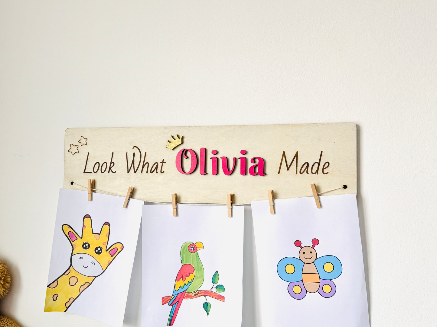 Personalized wooden kids artwork display sign, perfect for playroom and nursery wall decor.