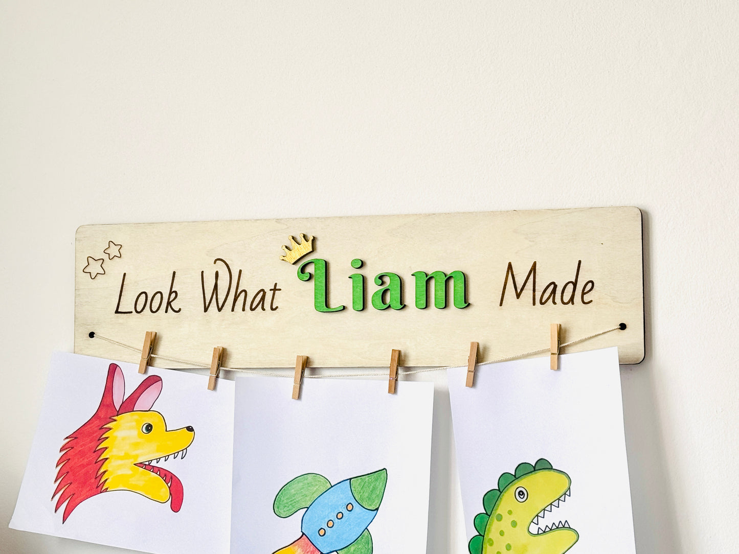 Personalized wooden kids artwork display sign, perfect for playroom and nursery wall decor.