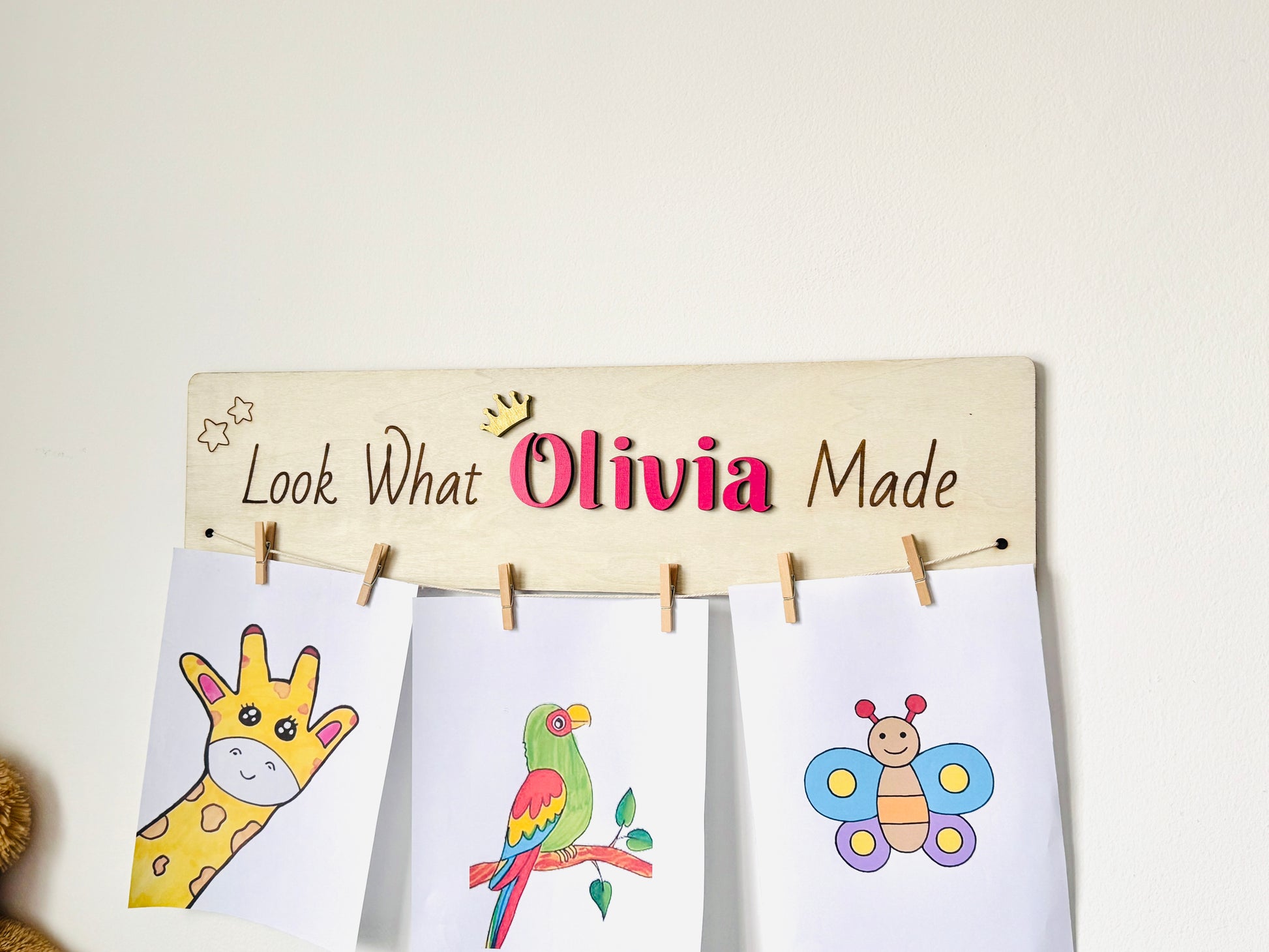 Personalized wooden kids artwork display sign, perfect for playroom and nursery wall decor.