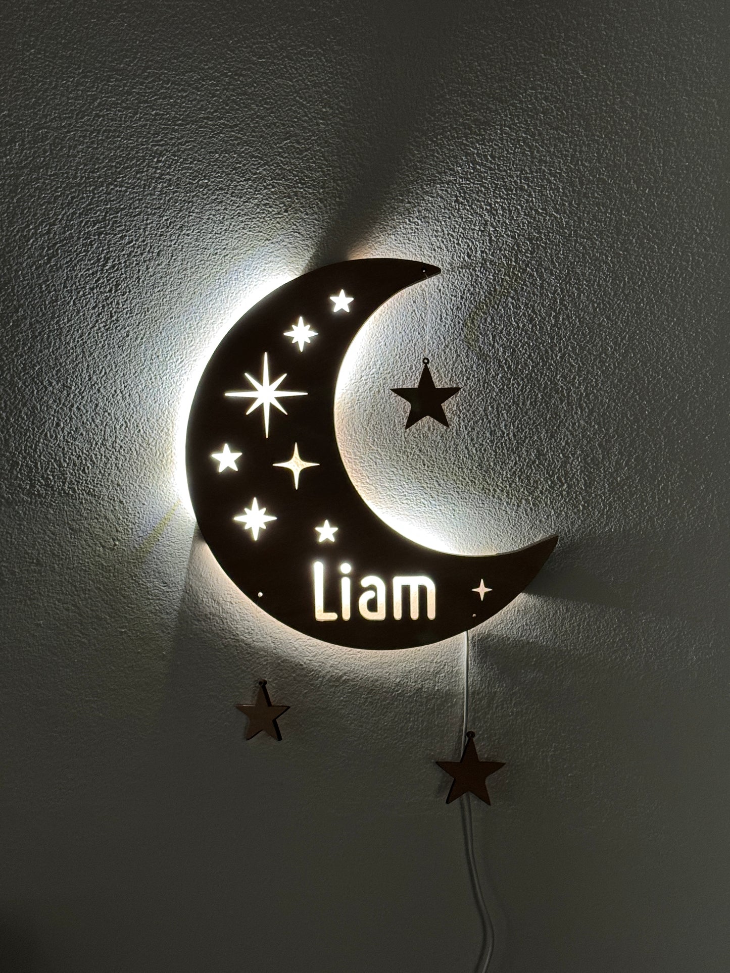 Personalized half moon LED wall light with name and hanging stars – perfect for nursery or kids’ room night light.