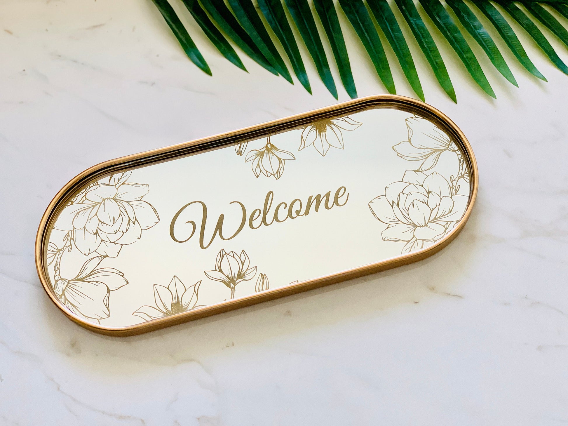Personalized oval gold jewelry mirror tray with engraved magnolia flowers and custom name, elegant vanity organizer for women