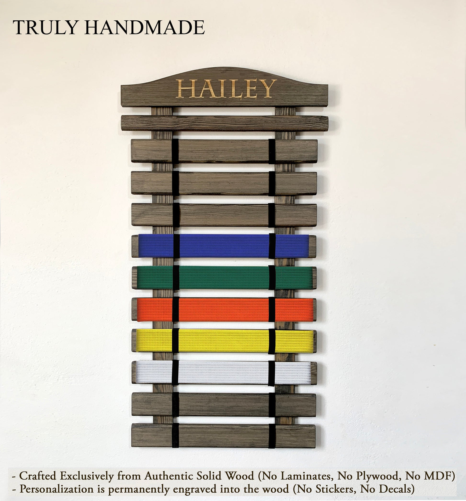 Personalized wooden martial arts belt display rack with engraved name, available in multiple colors and sizes (5-18 belts), perfect for Karate, Taekwondo, and Jiu-Jitsu practitioners.