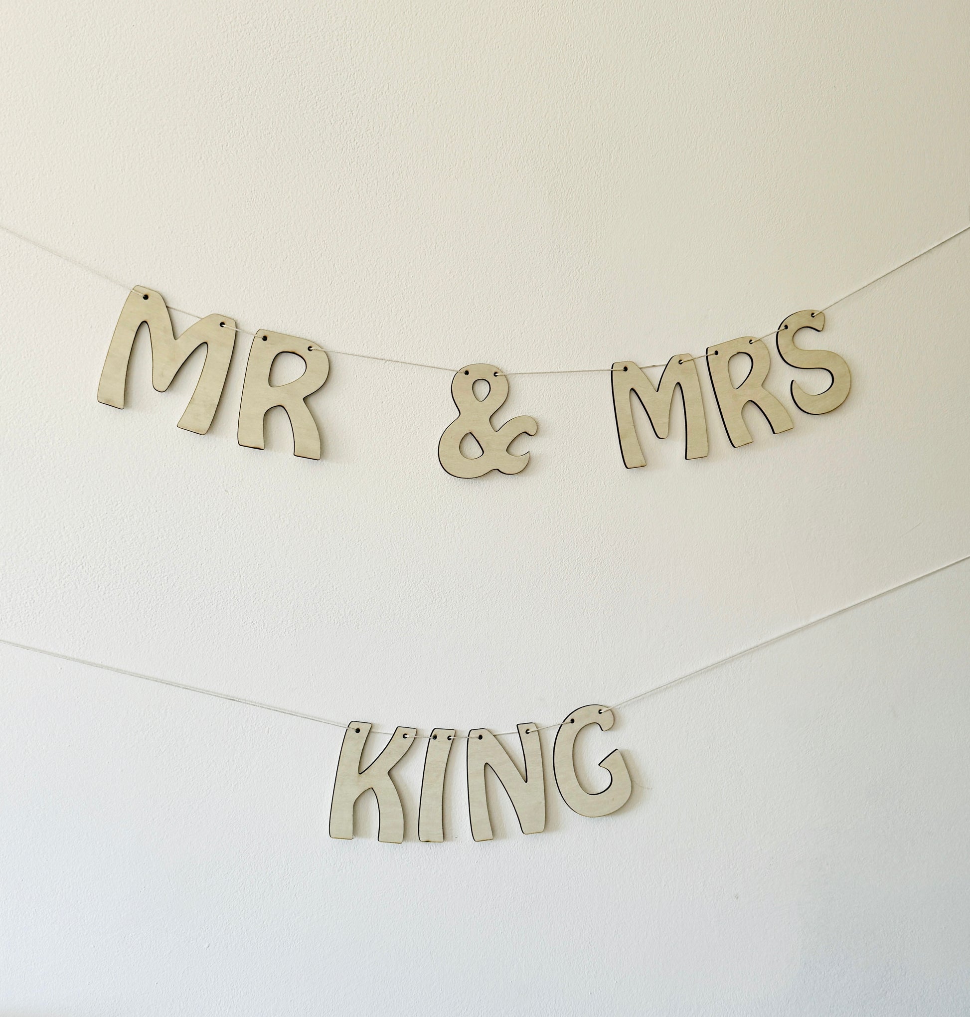 Engraved wooden wedding decoration bunting for rustic or boho weddings
