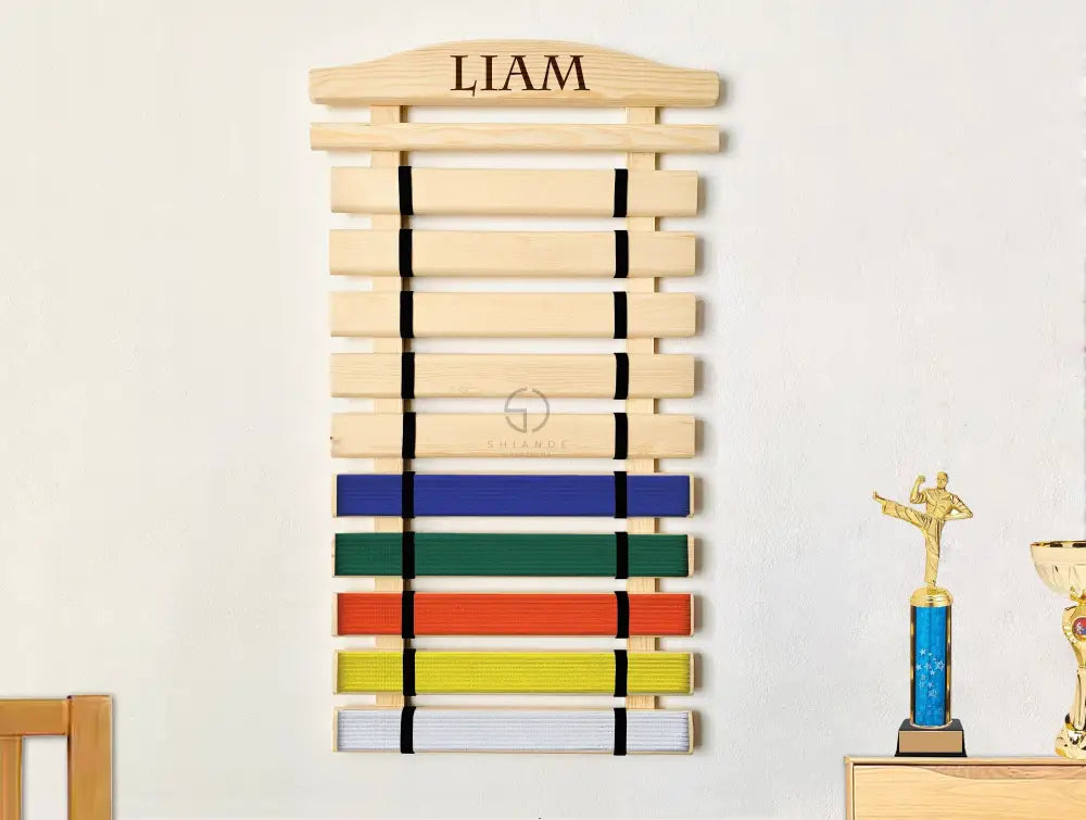 Personalized wooden karate belt display rack with engraved name