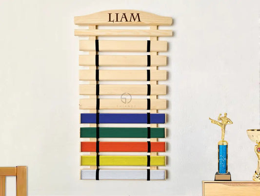 Personalized wooden karate belt display rack with engraved name